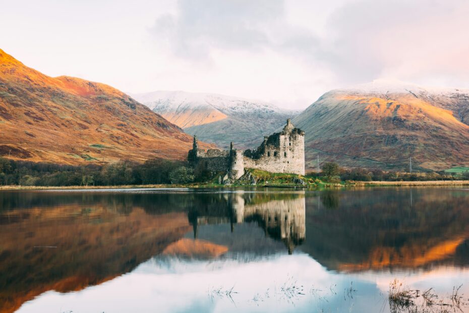 misty Scottish Highlands mountain and lake landscape